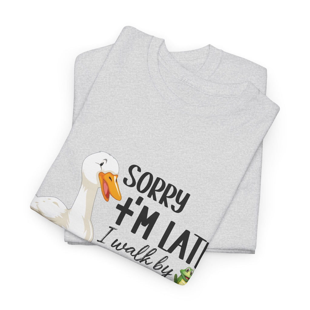 Christian Humor T-Shirt — “Sorry I’m Late, I Walk by Faith Tripping Constantly” (Duck & Frog). Unisex Cotton Tee