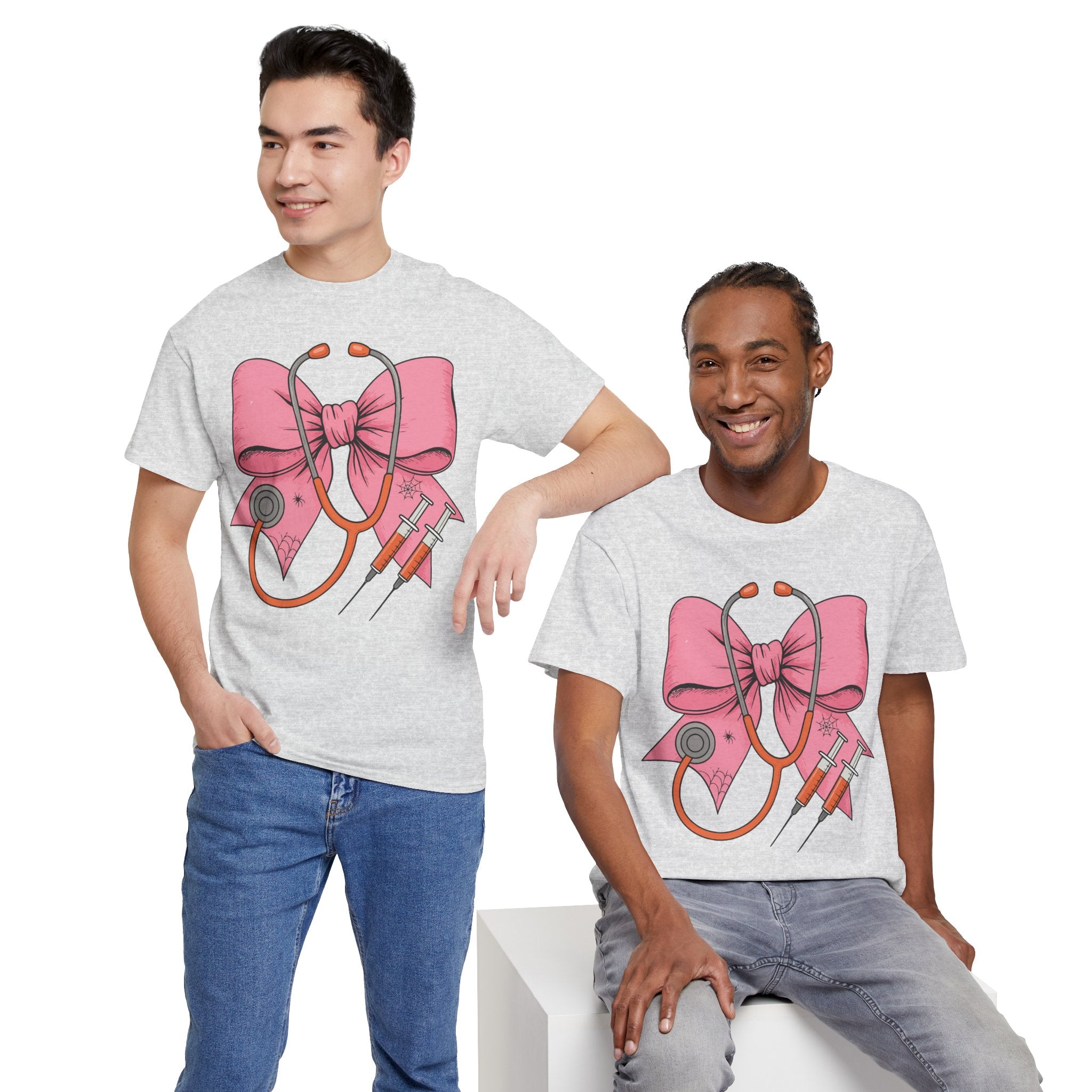 Halloween Nurse T‑Shirt — Pink Nurse Bow with Stethoscope, Syringes & Spider Webs..Unisex Cotton Tee