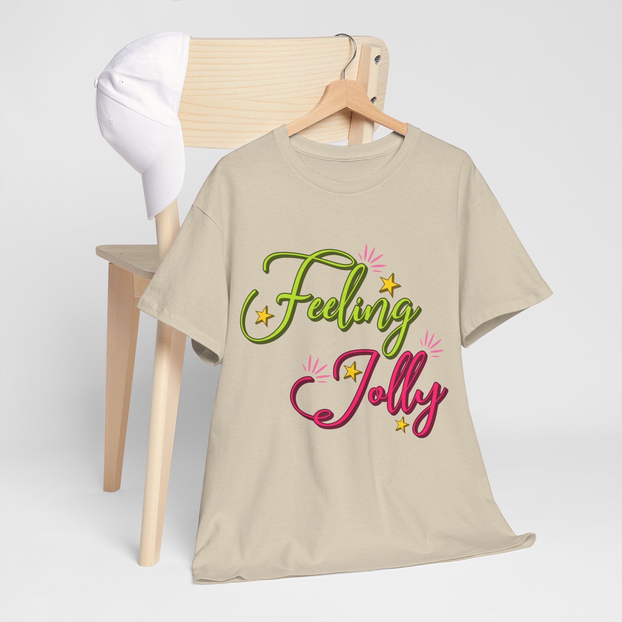 Feeling Jolly Tee — Festive Green & Pink Script with Yellow Stars Unisex Cotton Tee