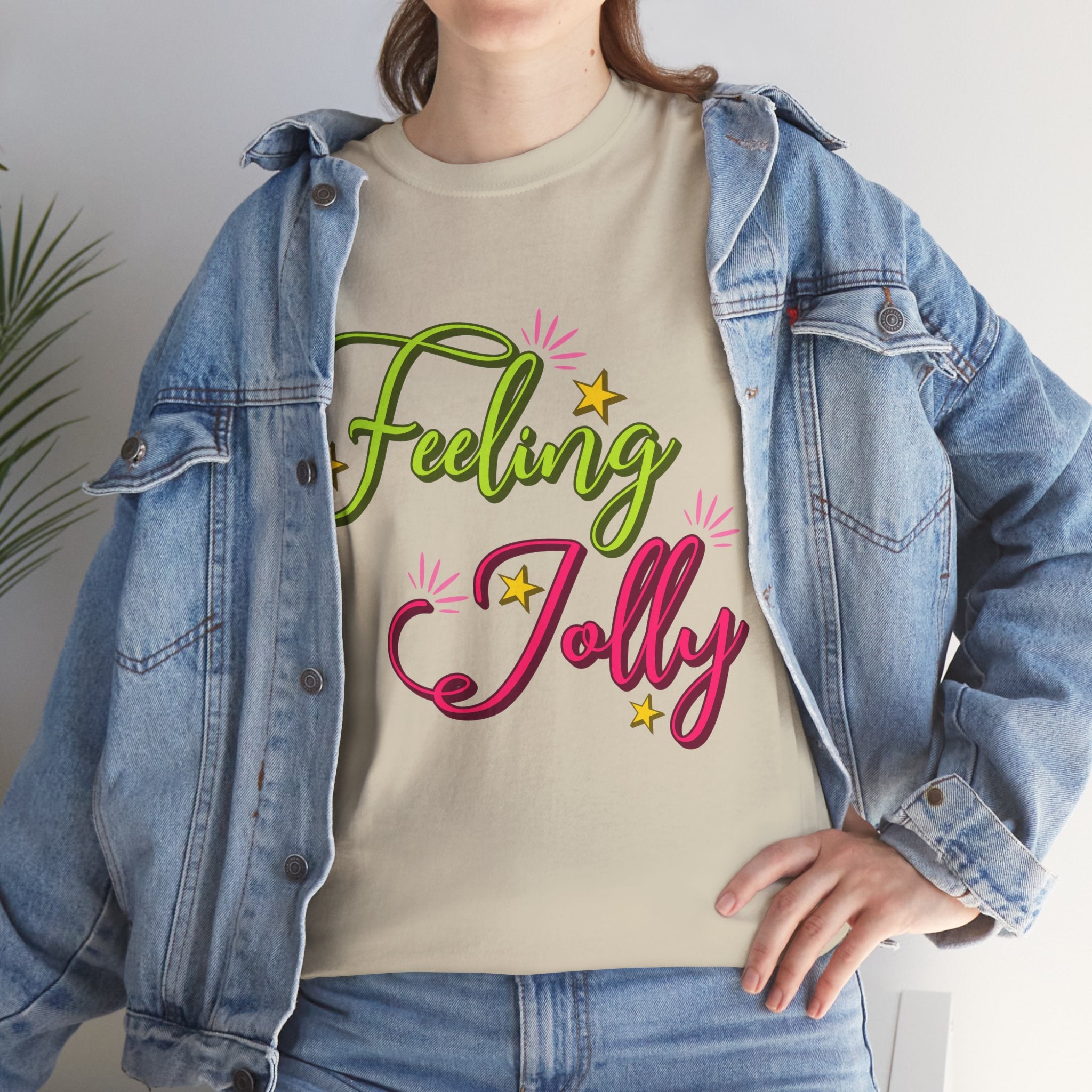 Feeling Jolly Tee — Festive Green & Pink Script with Yellow Stars Unisex Cotton Tee
