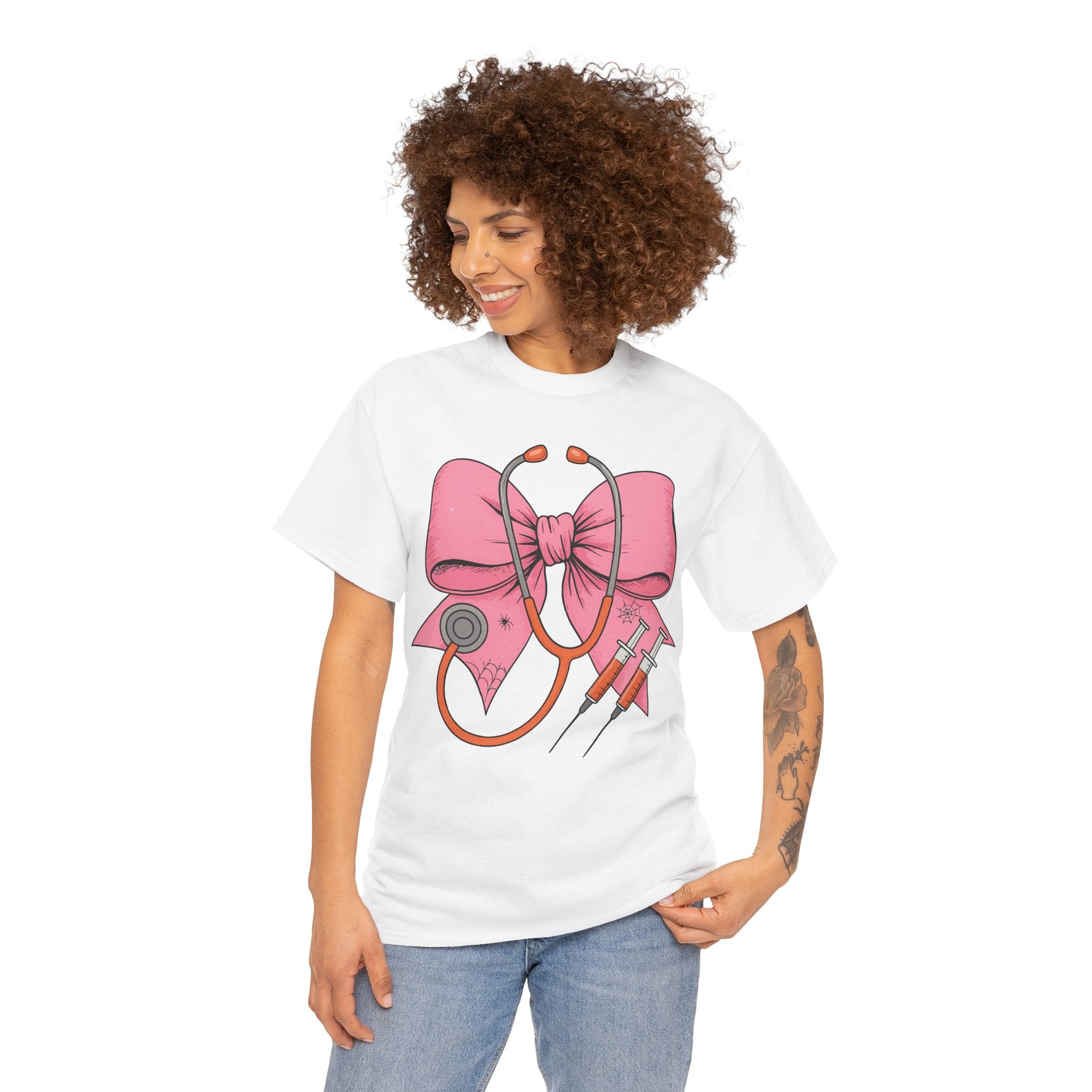 Halloween Nurse T‑Shirt — Pink Nurse Bow with Stethoscope, Syringes & Spider Webs..Unisex Cotton Tee