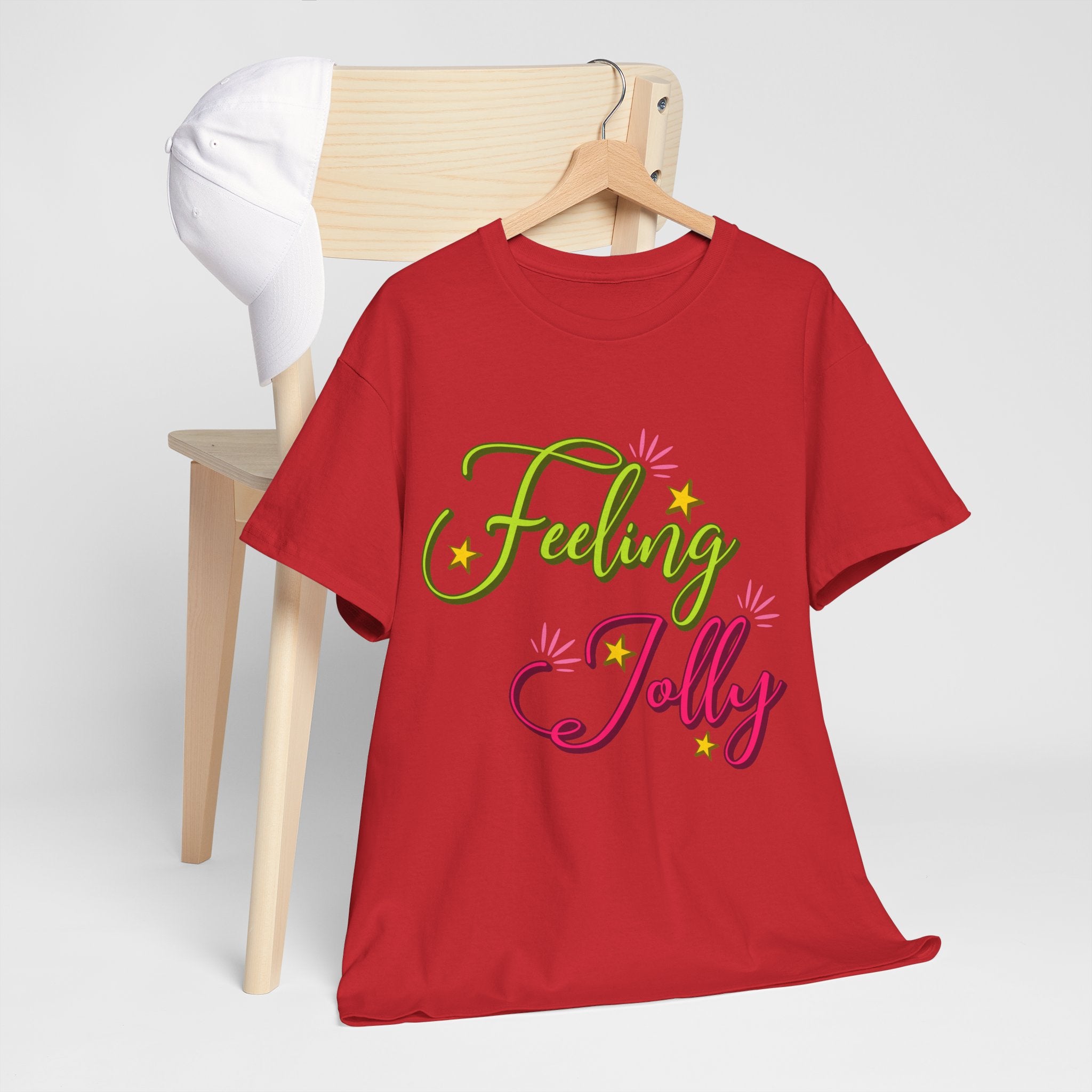 Feeling Jolly Tee — Festive Green & Pink Script with Yellow Stars Unisex Cotton Tee