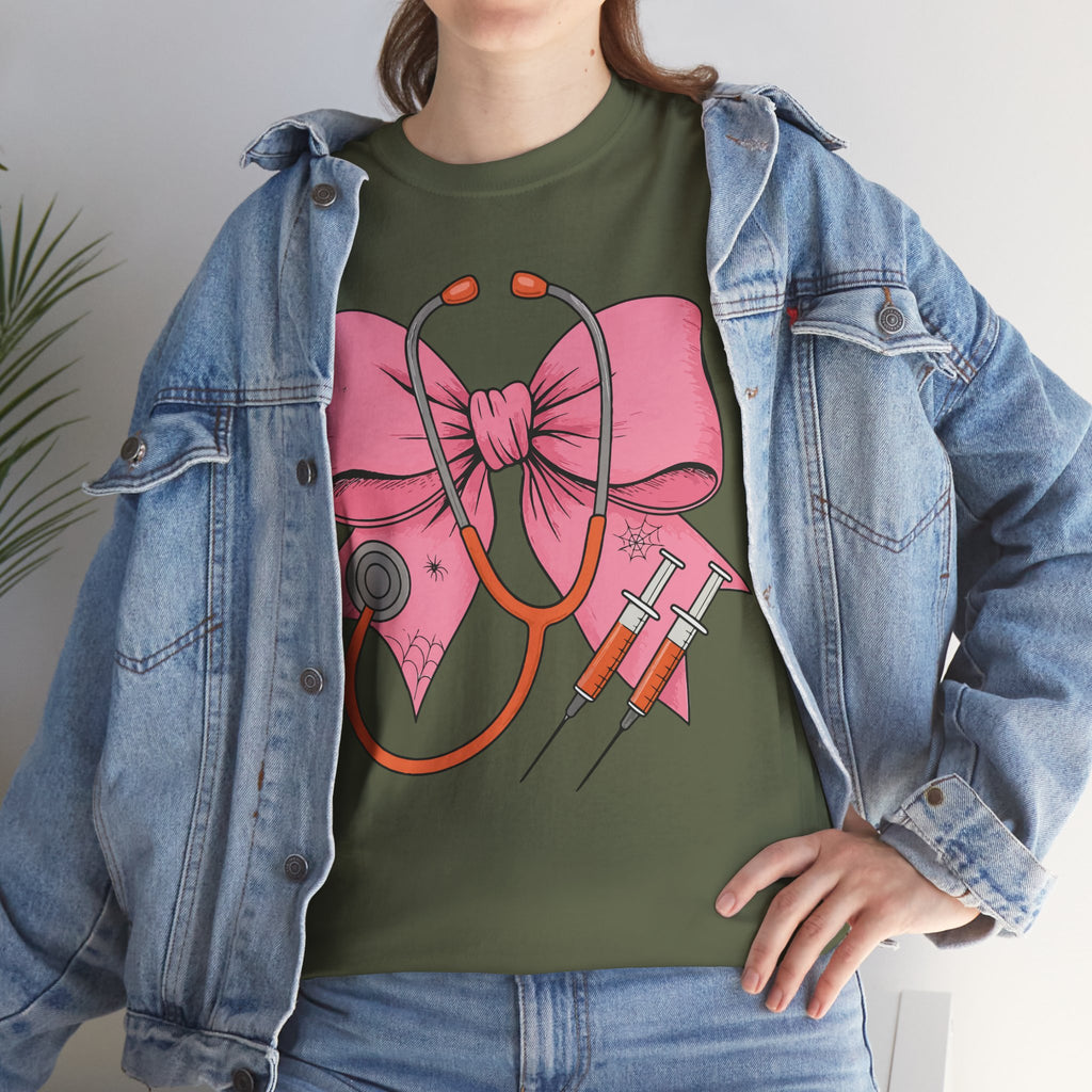 Halloween Nurse T‑Shirt — Pink Nurse Bow with Stethoscope, Syringes & Spider Webs..Unisex Cotton Tee