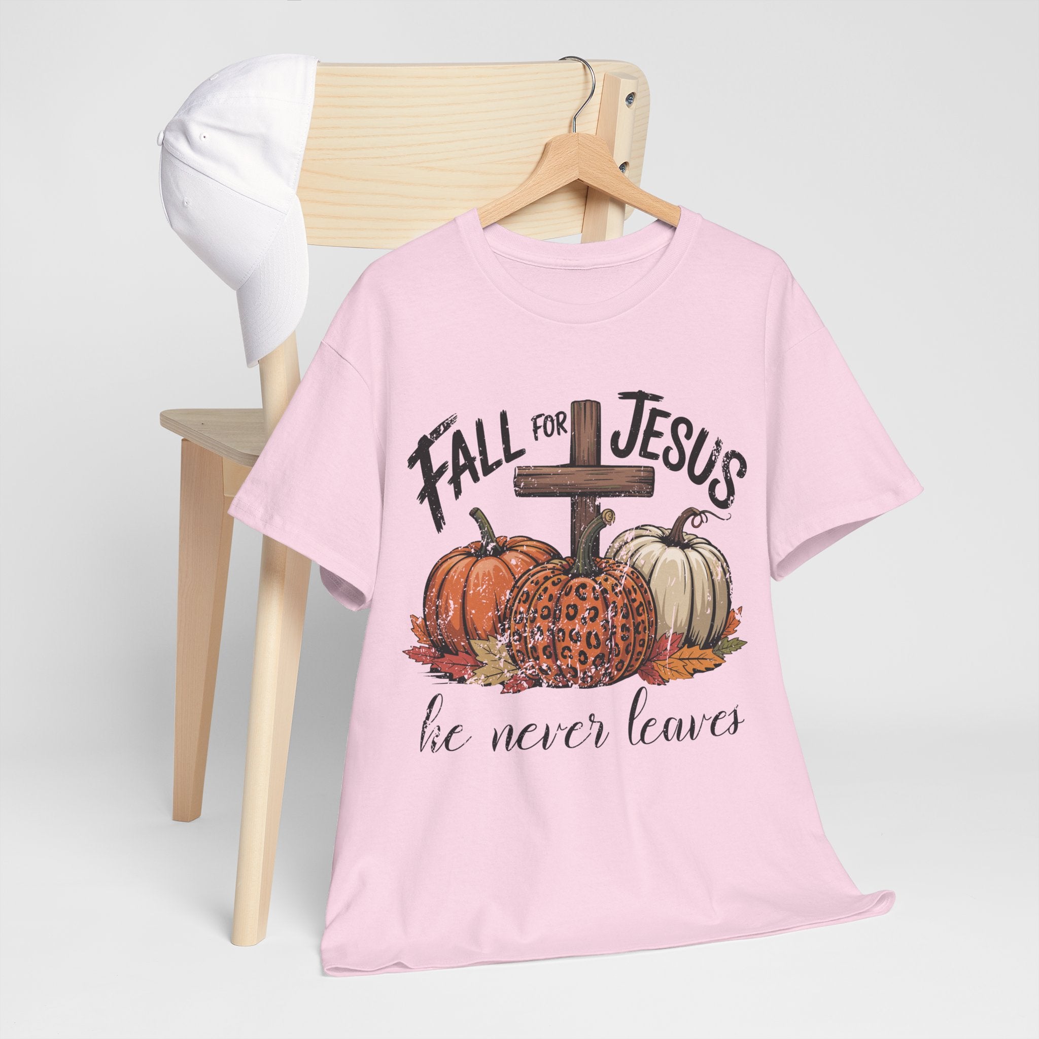 Fall for Jesus Pumpkin Cross Tee — "He Never Leaves" Autumn Christian Unisex Cotton T-Shirt