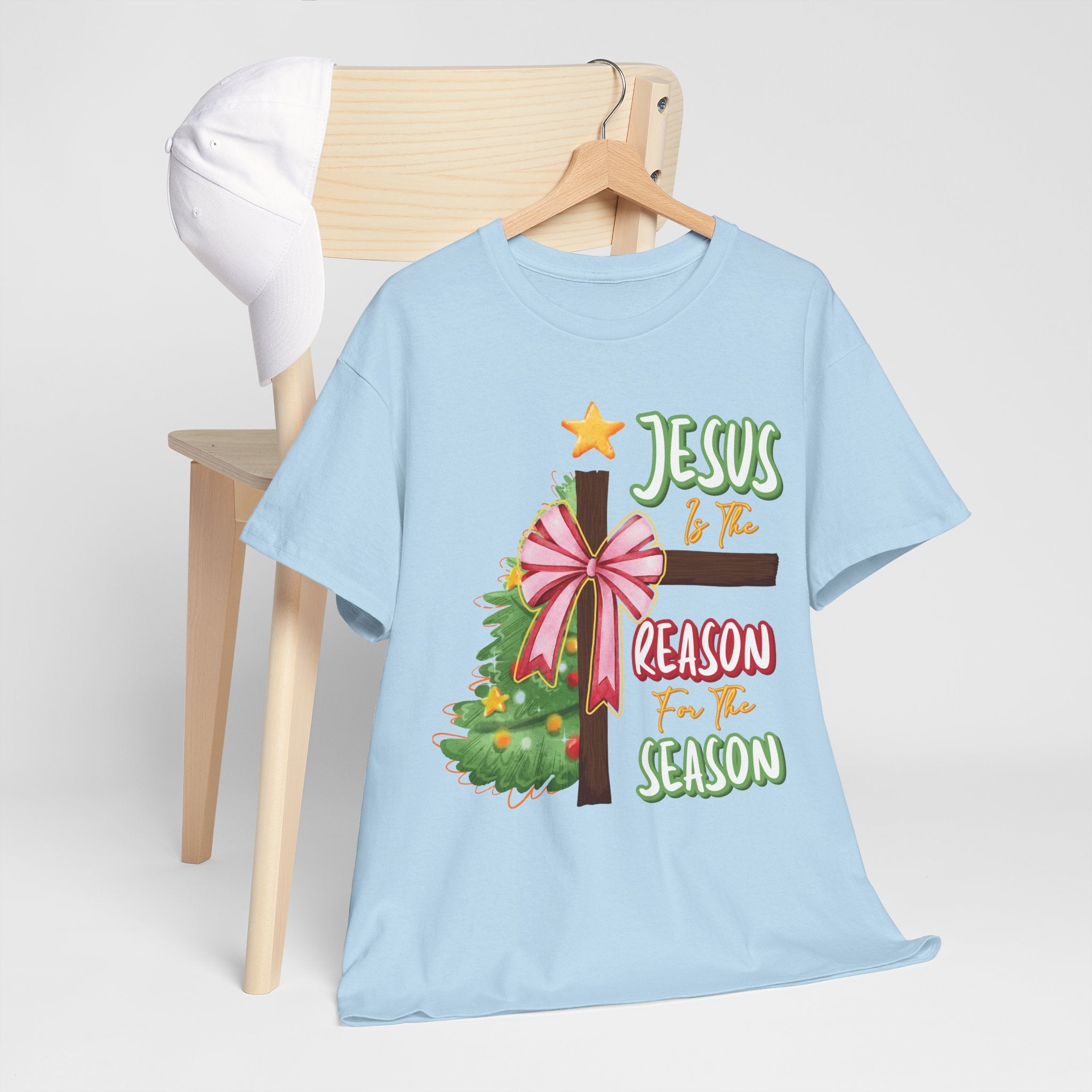 Jesus Is the Reason for the Season Christmas Tee — Cross with Pink Bow & Tree. Unisex Cotton Tee