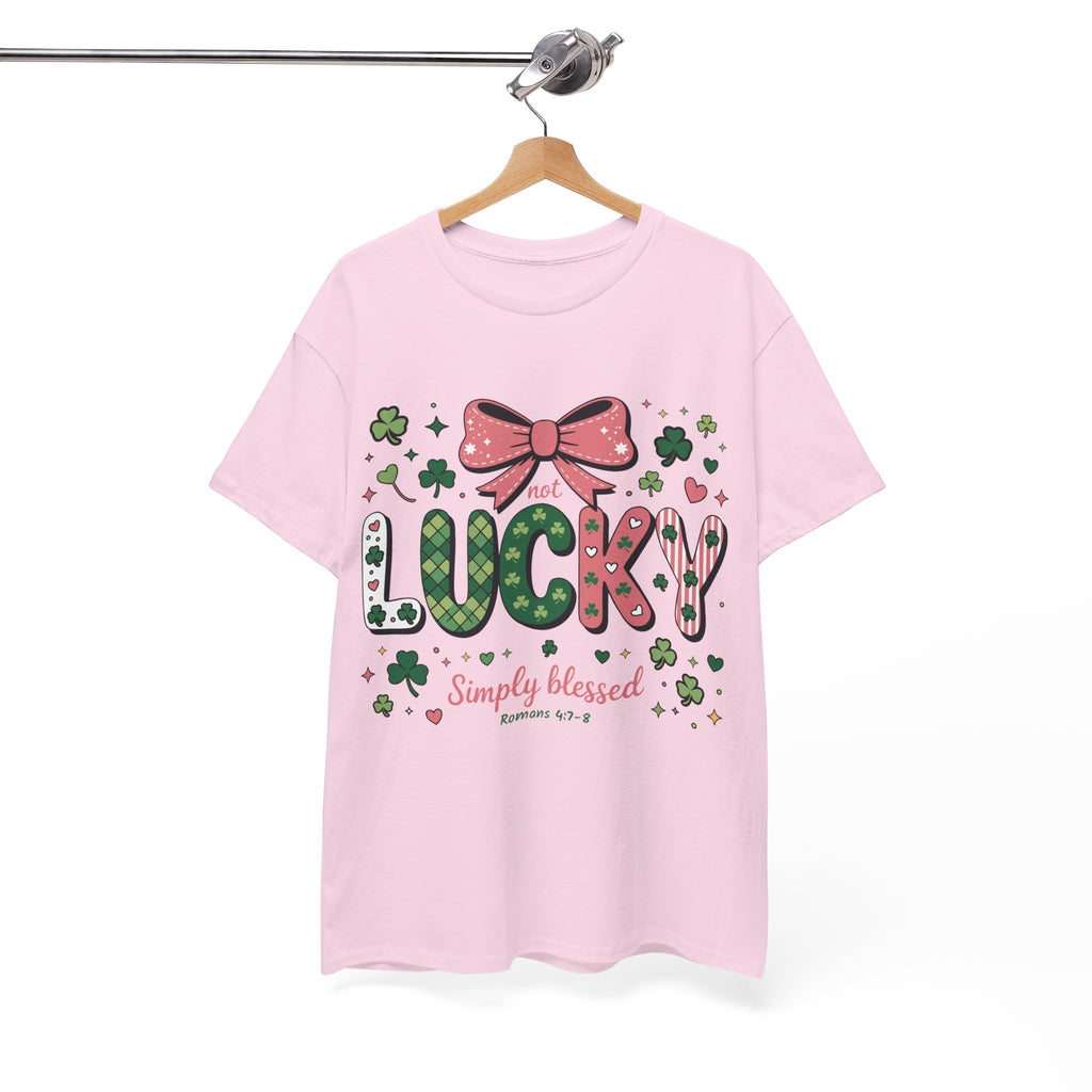 Simply Blessed Tee — “Not Lucky, Simply Blessed” with Pastel Bow, Clovers & Romans 4:7-8 Unisex Cotton Tee