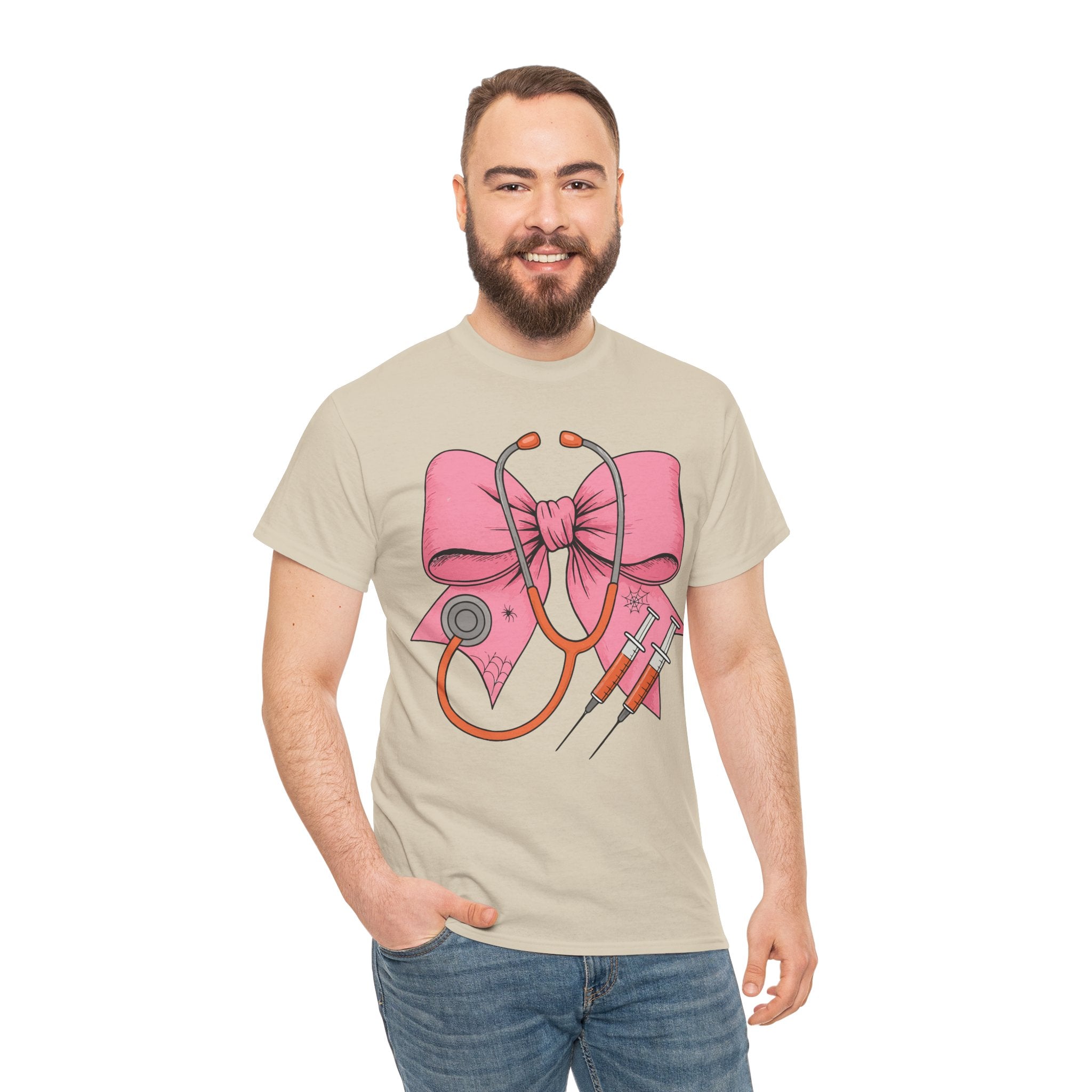 Halloween Nurse T‑Shirt — Pink Nurse Bow with Stethoscope, Syringes & Spider Webs..Unisex Cotton Tee