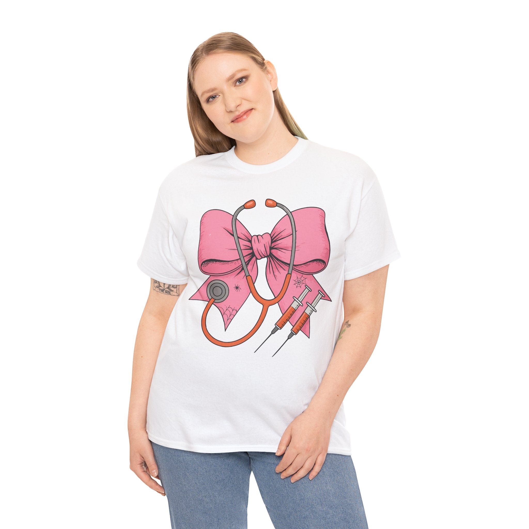 Halloween Nurse T‑Shirt — Pink Nurse Bow with Stethoscope, Syringes & Spider Webs..Unisex Cotton Tee