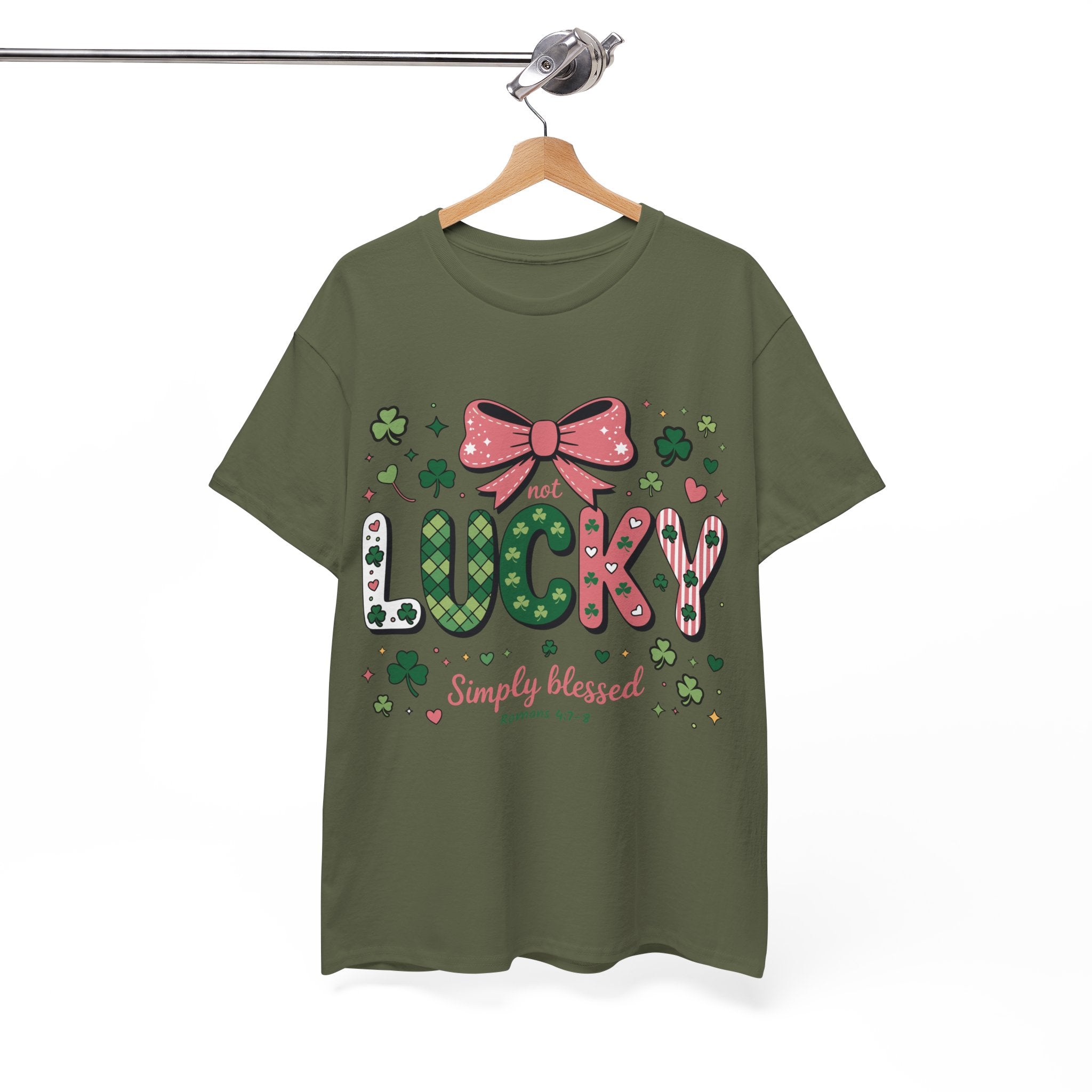Simply Blessed Tee — “Not Lucky, Simply Blessed” with Pastel Bow, Clovers & Romans 4:7-8 Unisex Cotton Tee