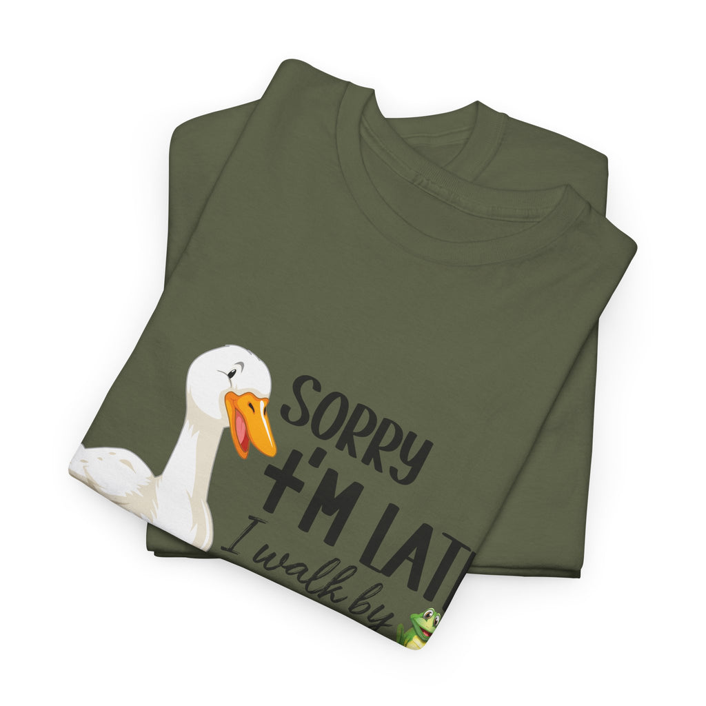 Christian Humor T-Shirt — “Sorry I’m Late, I Walk by Faith Tripping Constantly” (Duck & Frog). Unisex Cotton Tee