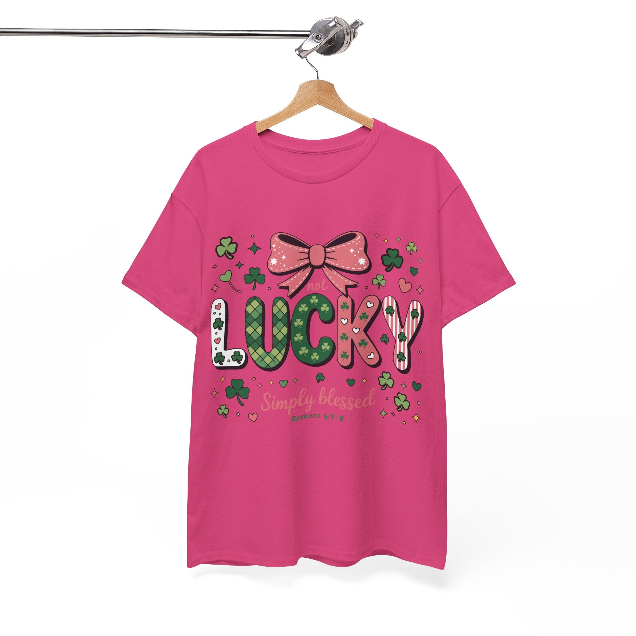 Simply Blessed Tee — “Not Lucky, Simply Blessed” with Pastel Bow, Clovers & Romans 4:7-8 Unisex Cotton Tee