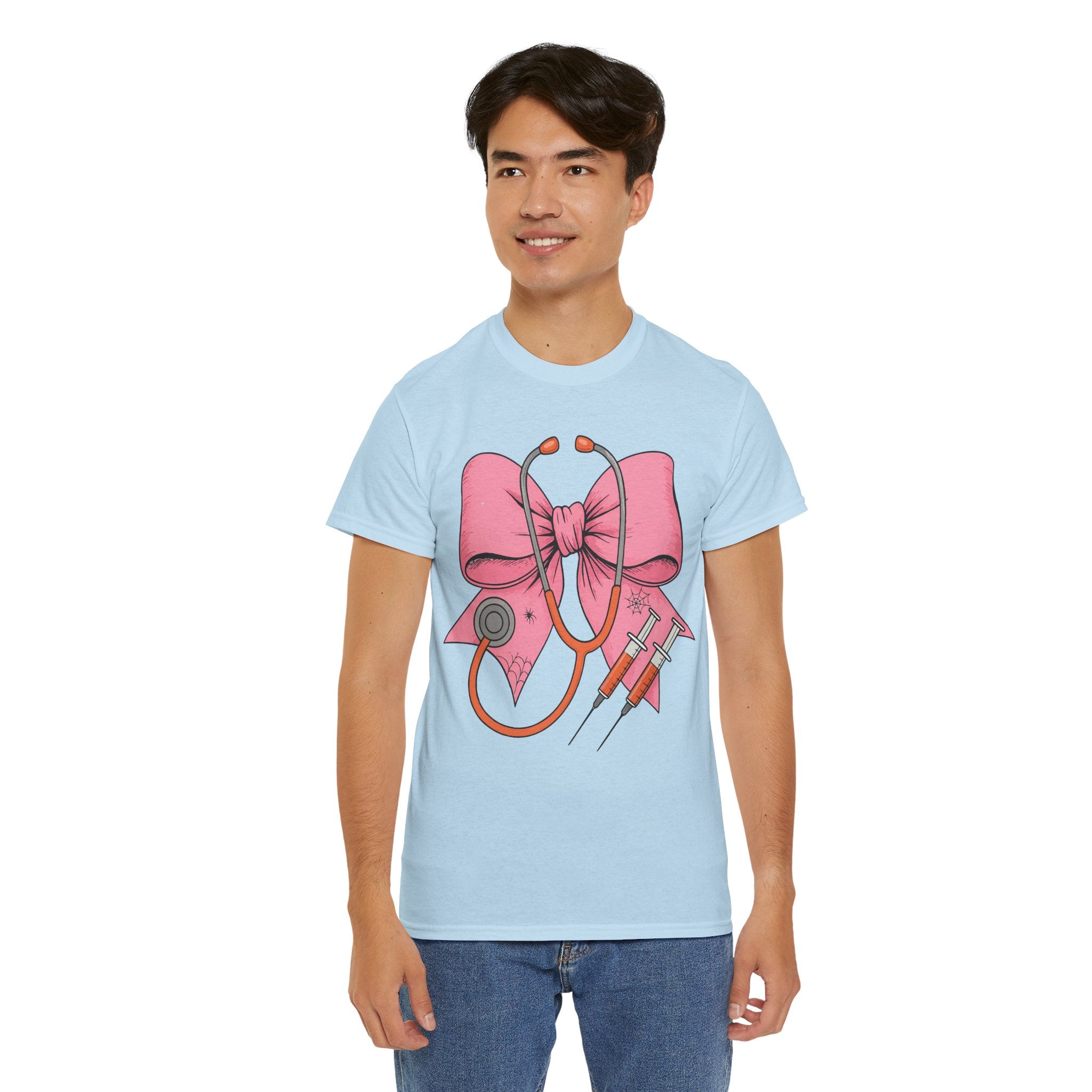 Halloween Nurse T‑Shirt — Pink Nurse Bow with Stethoscope, Syringes & Spider Webs..Unisex Cotton Tee