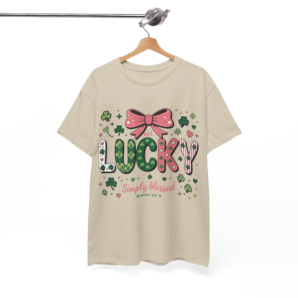 Simply Blessed Tee — “Not Lucky, Simply Blessed” with Pastel Bow, Clovers & Romans 4:7-8 Unisex Cotton Tee