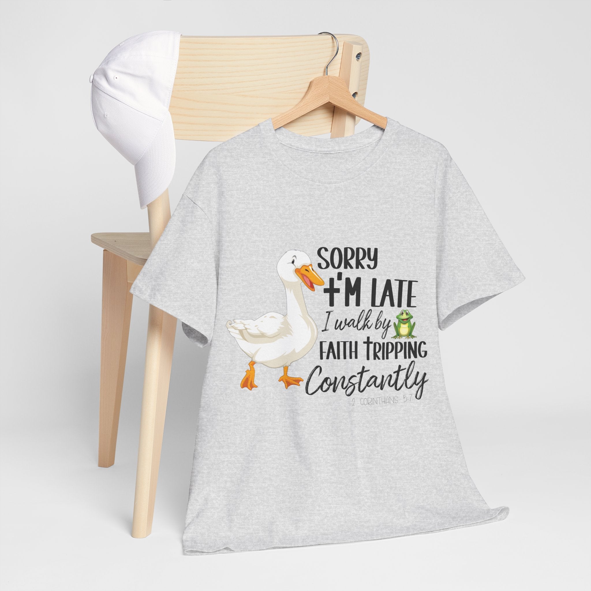 Christian Humor T-Shirt — “Sorry I’m Late, I Walk by Faith Tripping Constantly” (Duck & Frog). Unisex Cotton Tee