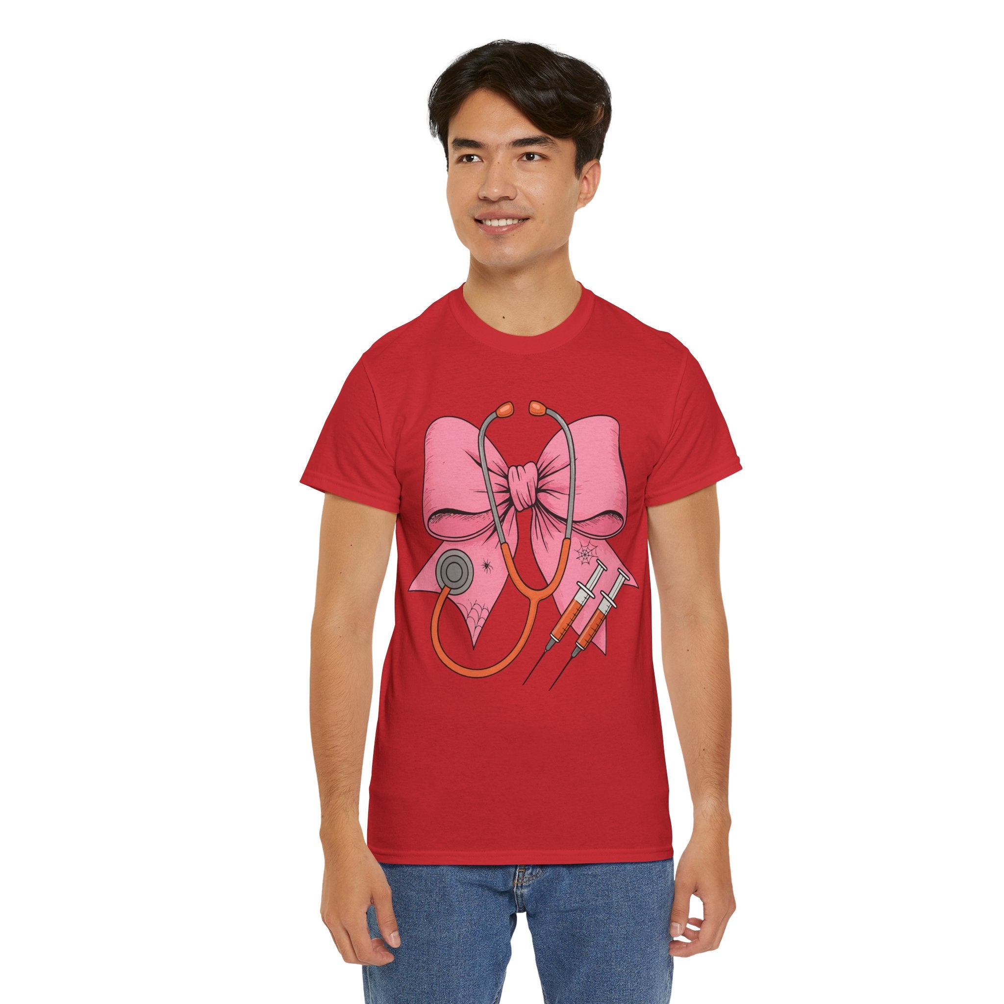 Halloween Nurse T‑Shirt — Pink Nurse Bow with Stethoscope, Syringes & Spider Webs..Unisex Cotton Tee