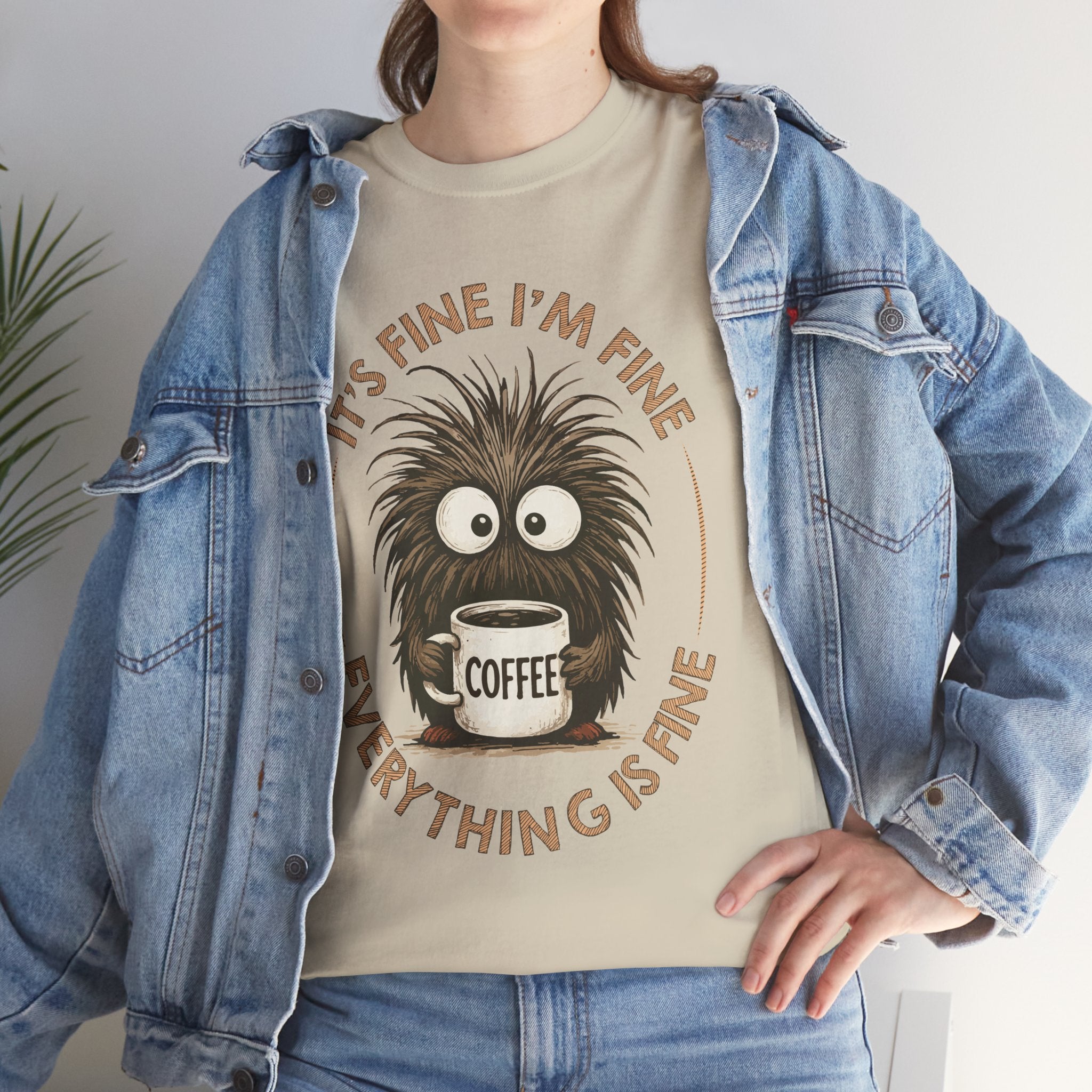 Funny Coffee Tee — “It’s fine I’m fine everything is fine” Fuzzy Creature Mug Unisex Cotton Tee