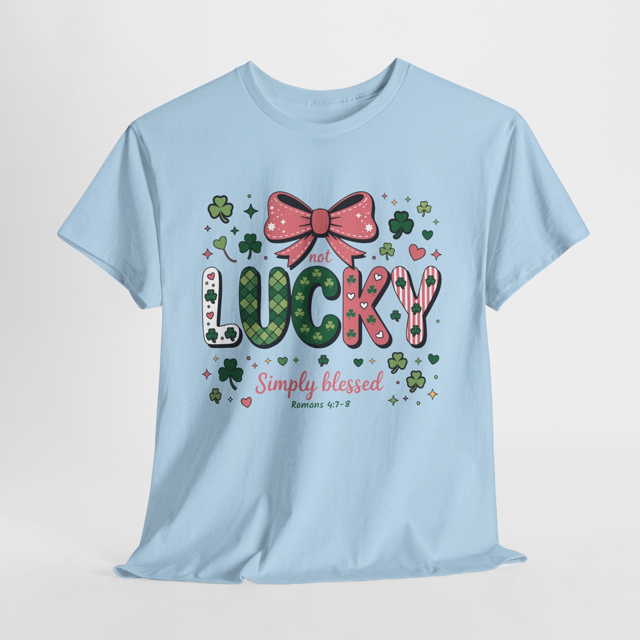 Simply Blessed Tee — “Not Lucky, Simply Blessed” with Pastel Bow, Clovers & Romans 4:7-8 Unisex Cotton Tee