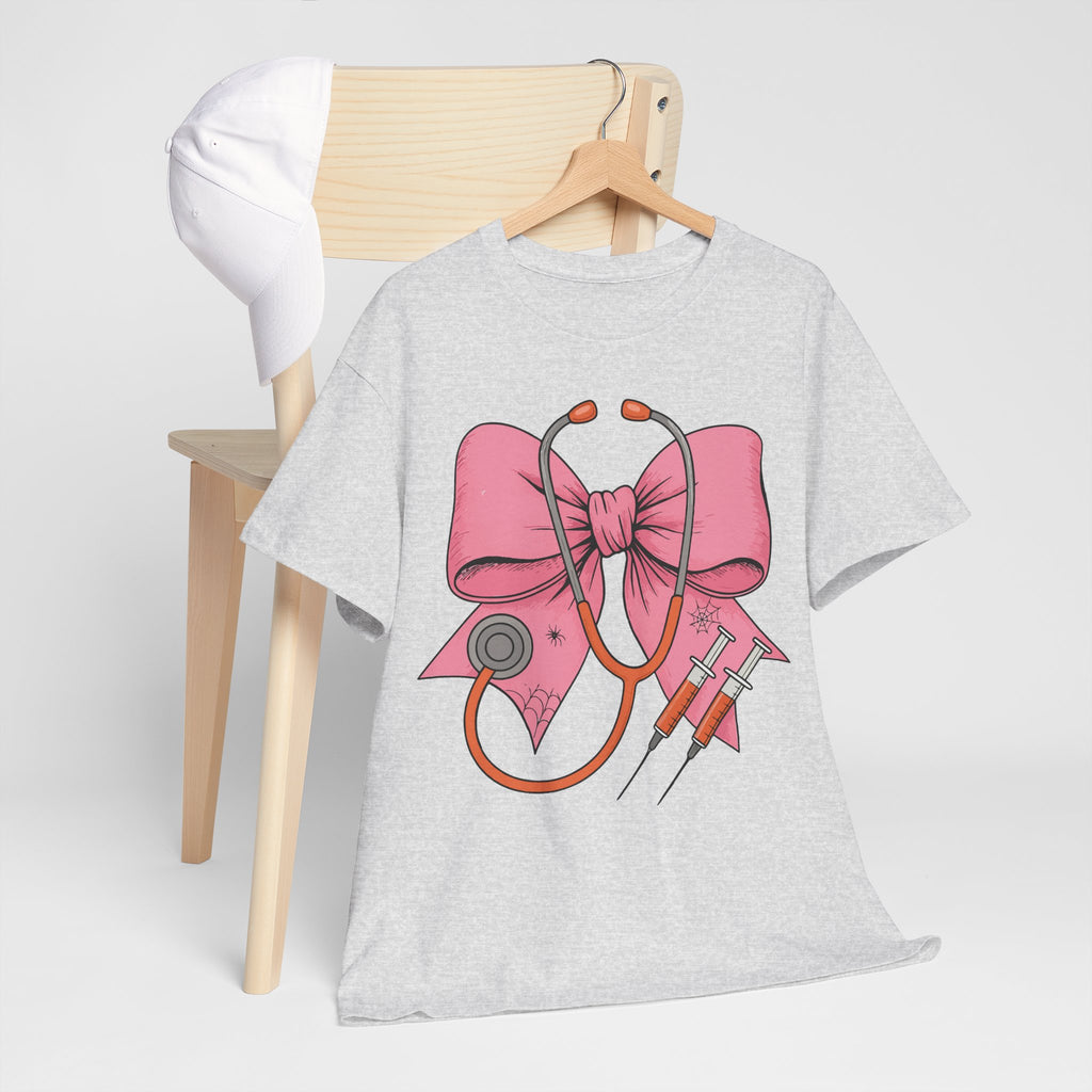 Halloween Nurse T‑Shirt — Pink Nurse Bow with Stethoscope, Syringes & Spider Webs..Unisex Cotton Tee