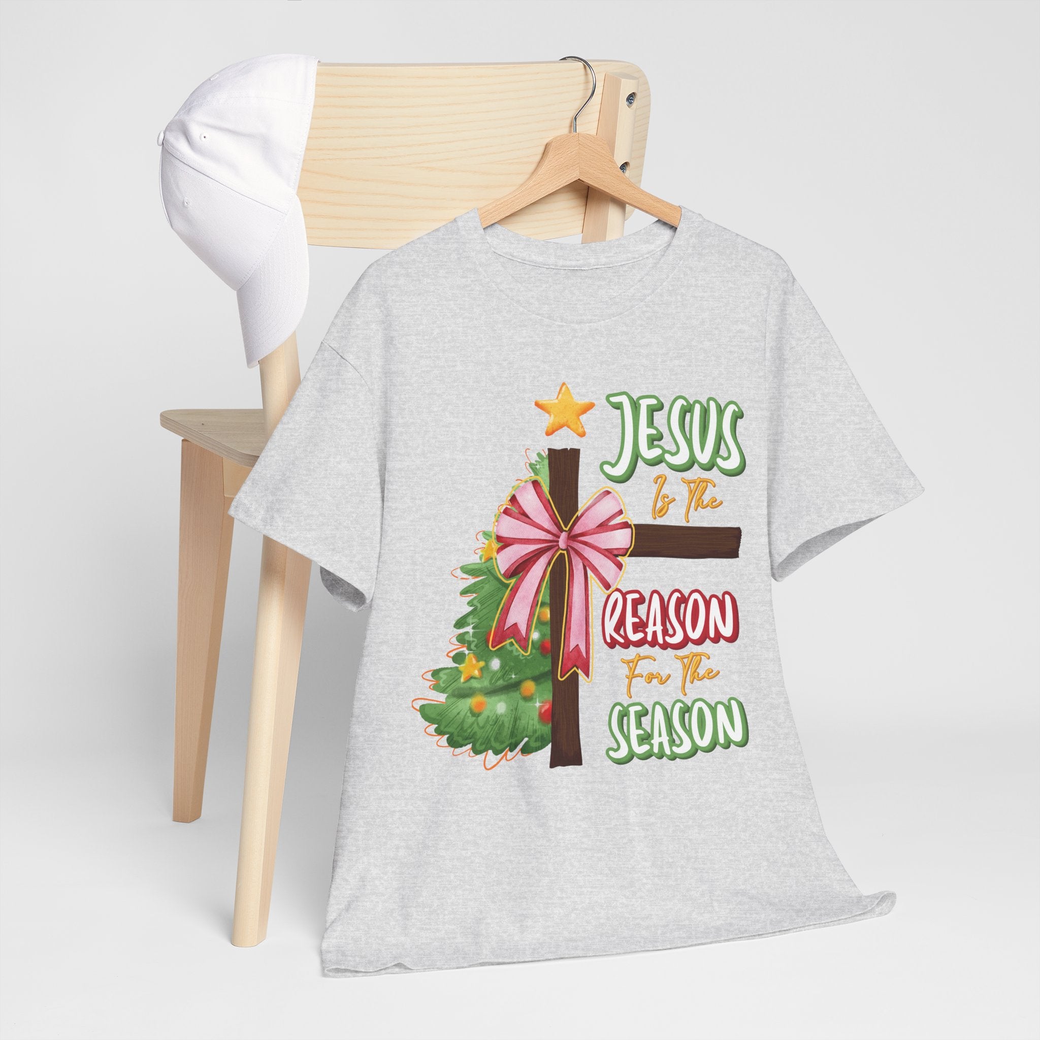 Jesus Is the Reason for the Season Christmas Tee — Cross with Pink Bow & Tree. Unisex Cotton Tee