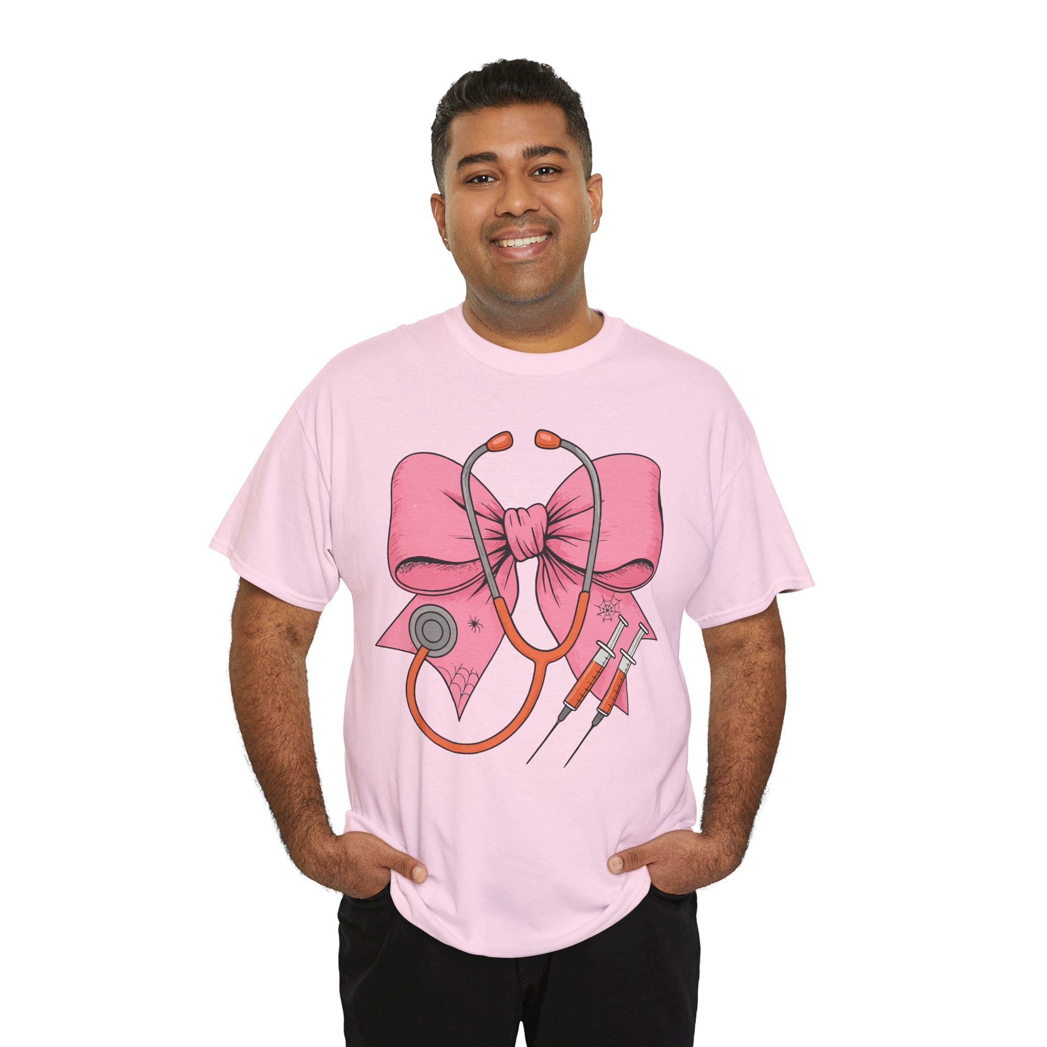 Halloween Nurse T‑Shirt — Pink Nurse Bow with Stethoscope, Syringes & Spider Webs..Unisex Cotton Tee