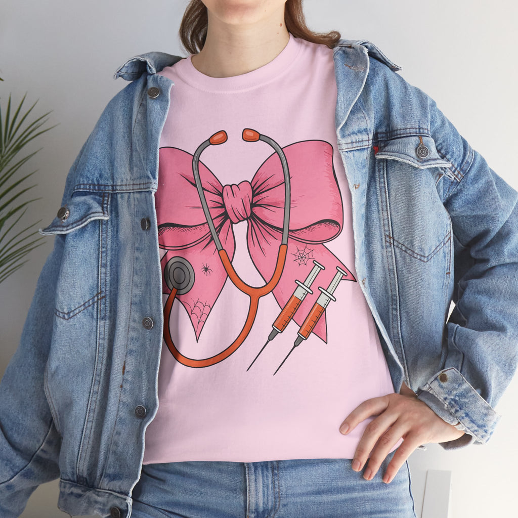 Halloween Nurse T‑Shirt — Pink Nurse Bow with Stethoscope, Syringes & Spider Webs..Unisex Cotton Tee