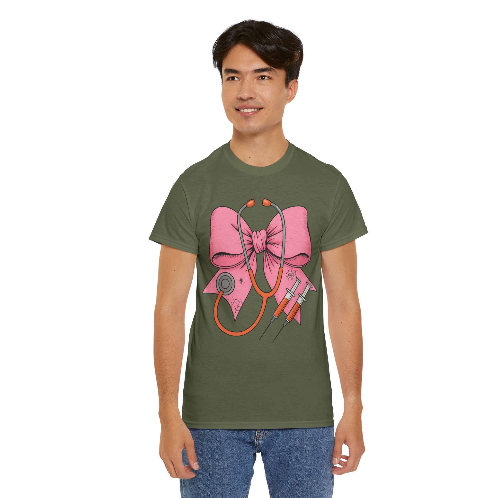 Halloween Nurse T‑Shirt — Pink Nurse Bow with Stethoscope, Syringes & Spider Webs..Unisex Cotton Tee