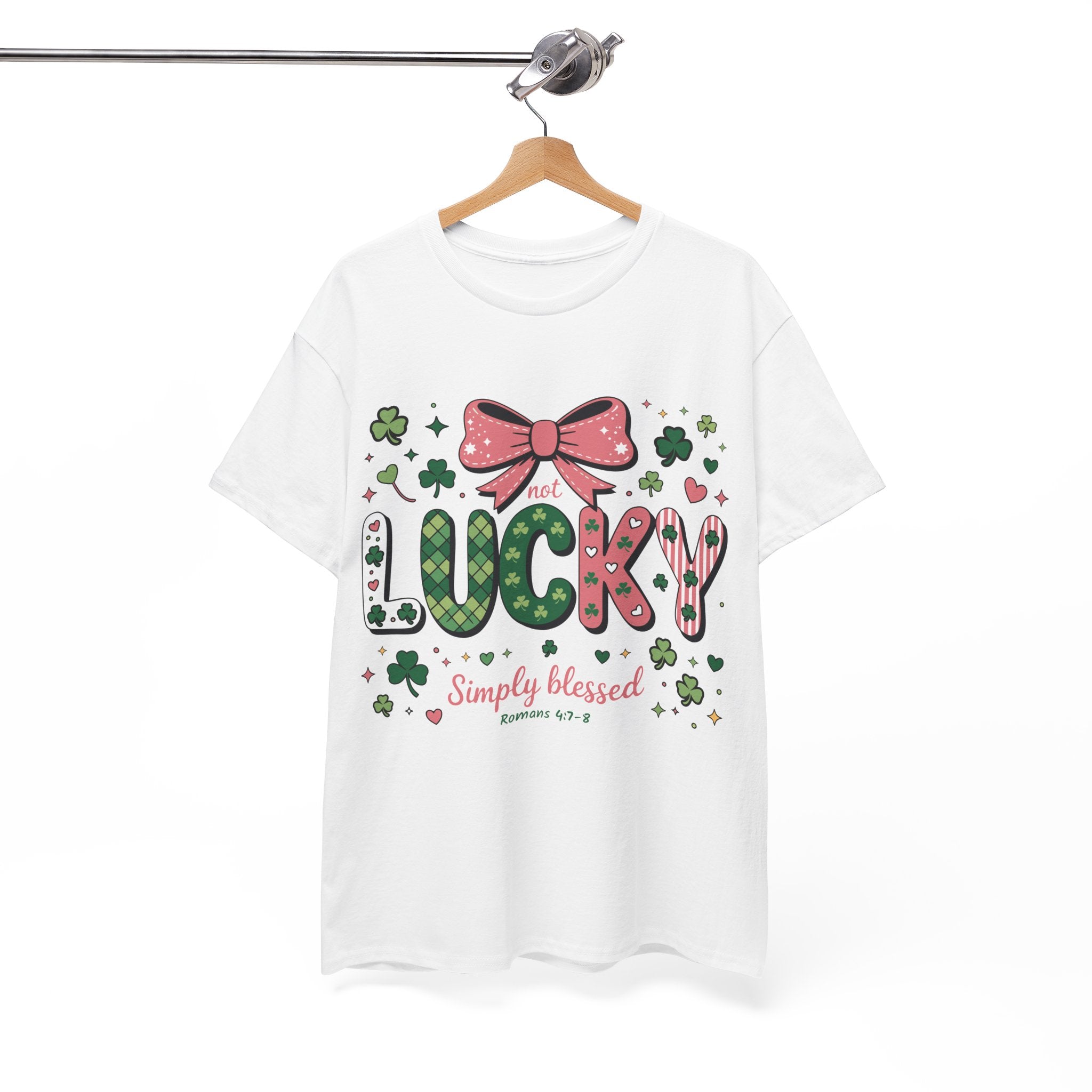 Simply Blessed Tee — “Not Lucky, Simply Blessed” with Pastel Bow, Clovers & Romans 4:7-8 Unisex Cotton Tee