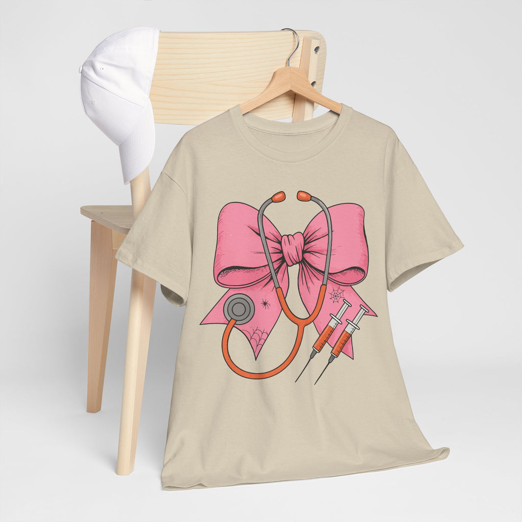 Halloween Nurse T‑Shirt — Pink Nurse Bow with Stethoscope, Syringes & Spider Webs..Unisex Cotton Tee