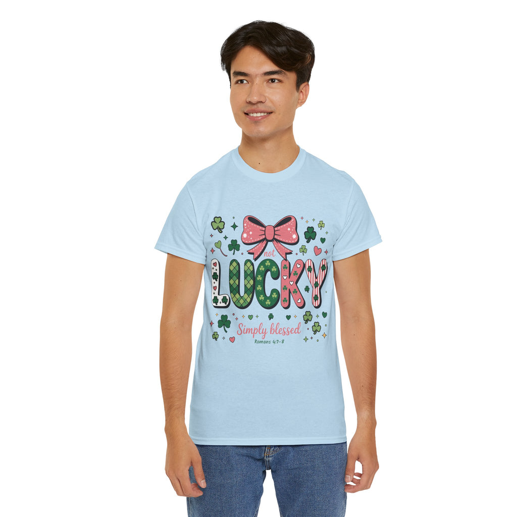 Simply Blessed Tee — “Not Lucky, Simply Blessed” with Pastel Bow, Clovers & Romans 4:7-8 Unisex Cotton Tee