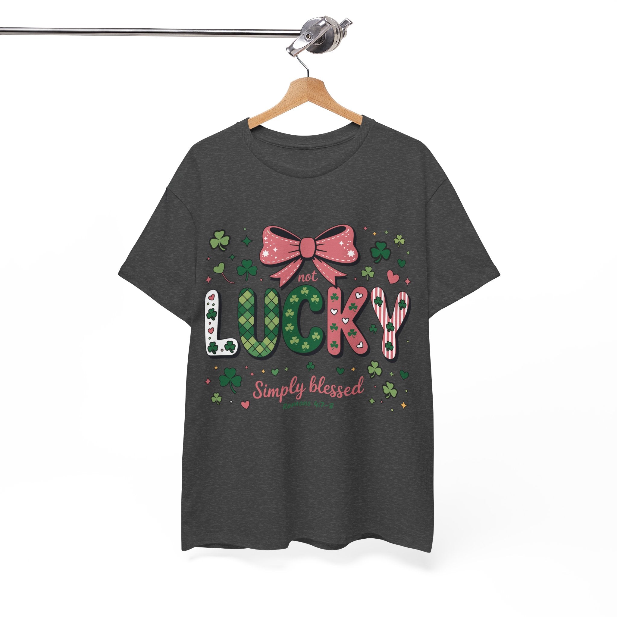 Simply Blessed Tee — “Not Lucky, Simply Blessed” with Pastel Bow, Clovers & Romans 4:7-8 Unisex Cotton Tee
