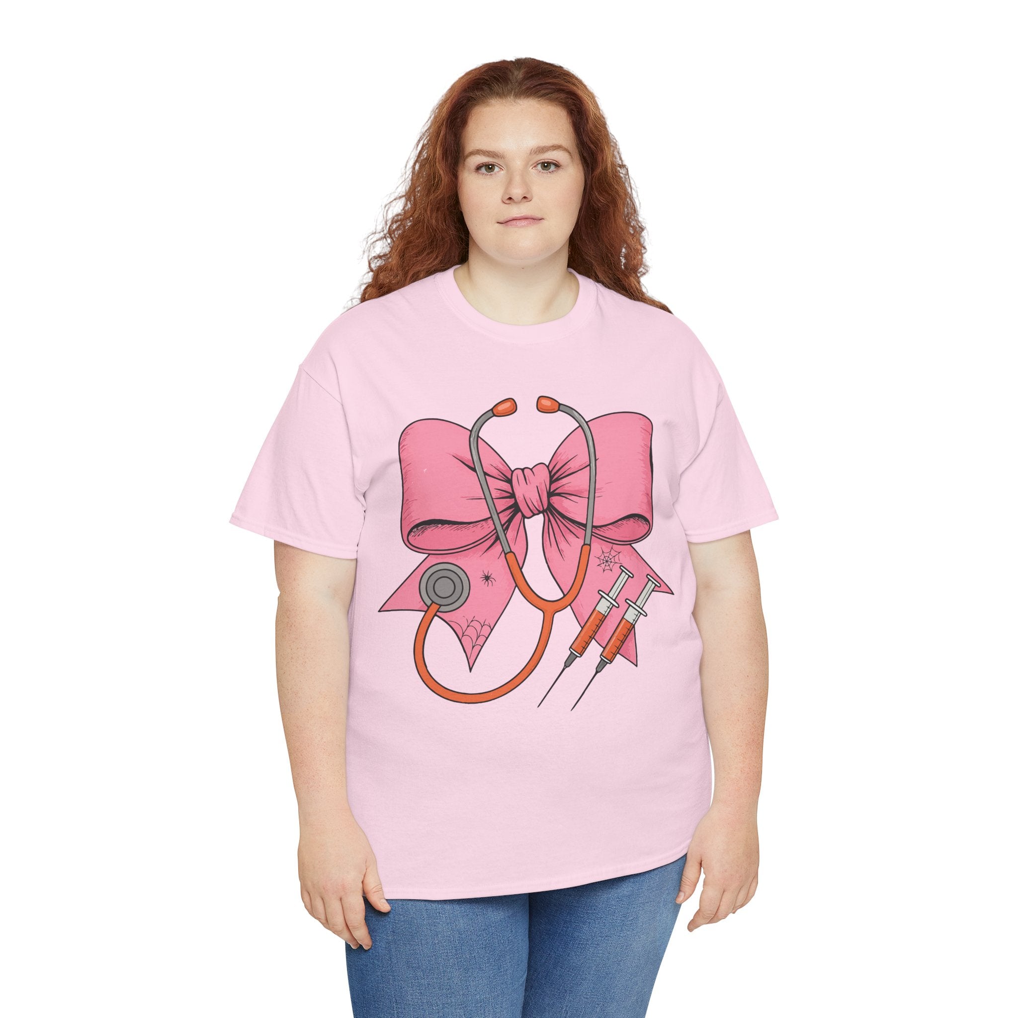 Halloween Nurse T‑Shirt — Pink Nurse Bow with Stethoscope, Syringes & Spider Webs..Unisex Cotton Tee