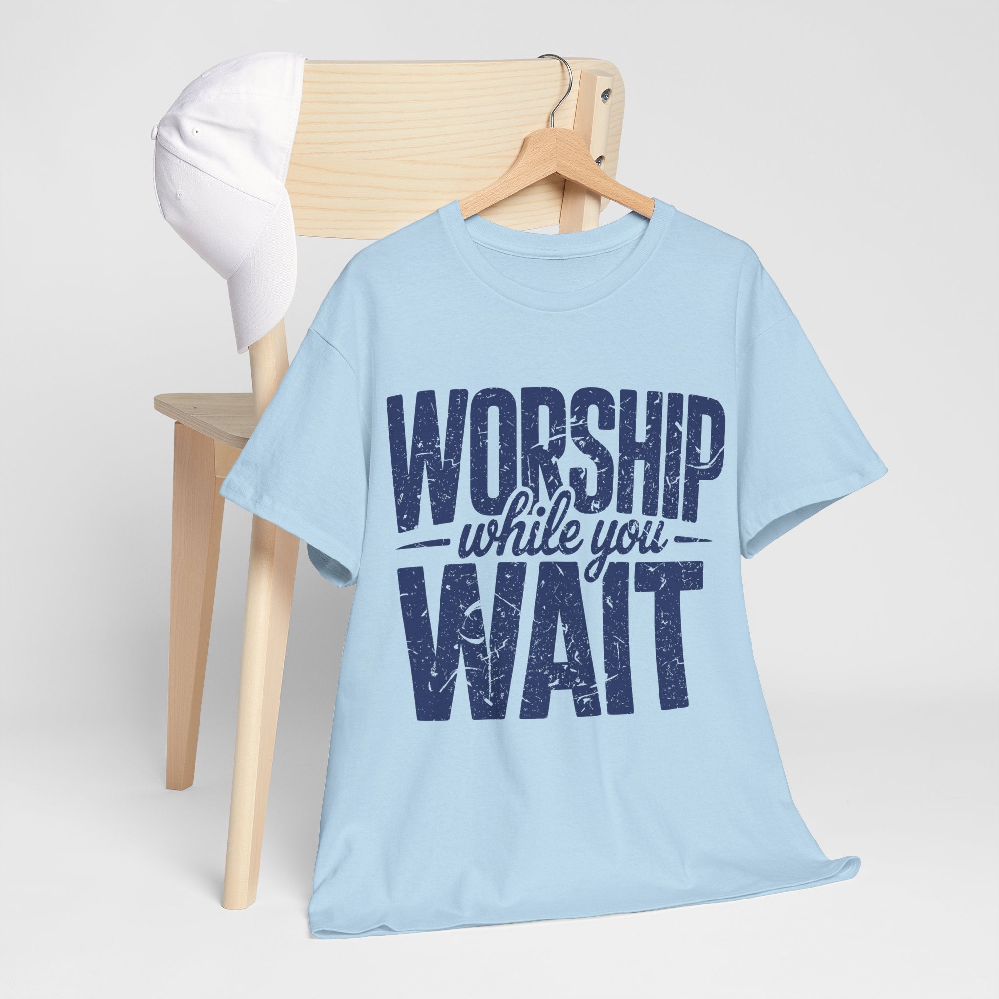 Worship While You Wait T‑Shirt — Distressed Pastel Blue Faith Unisex Cotton Tee