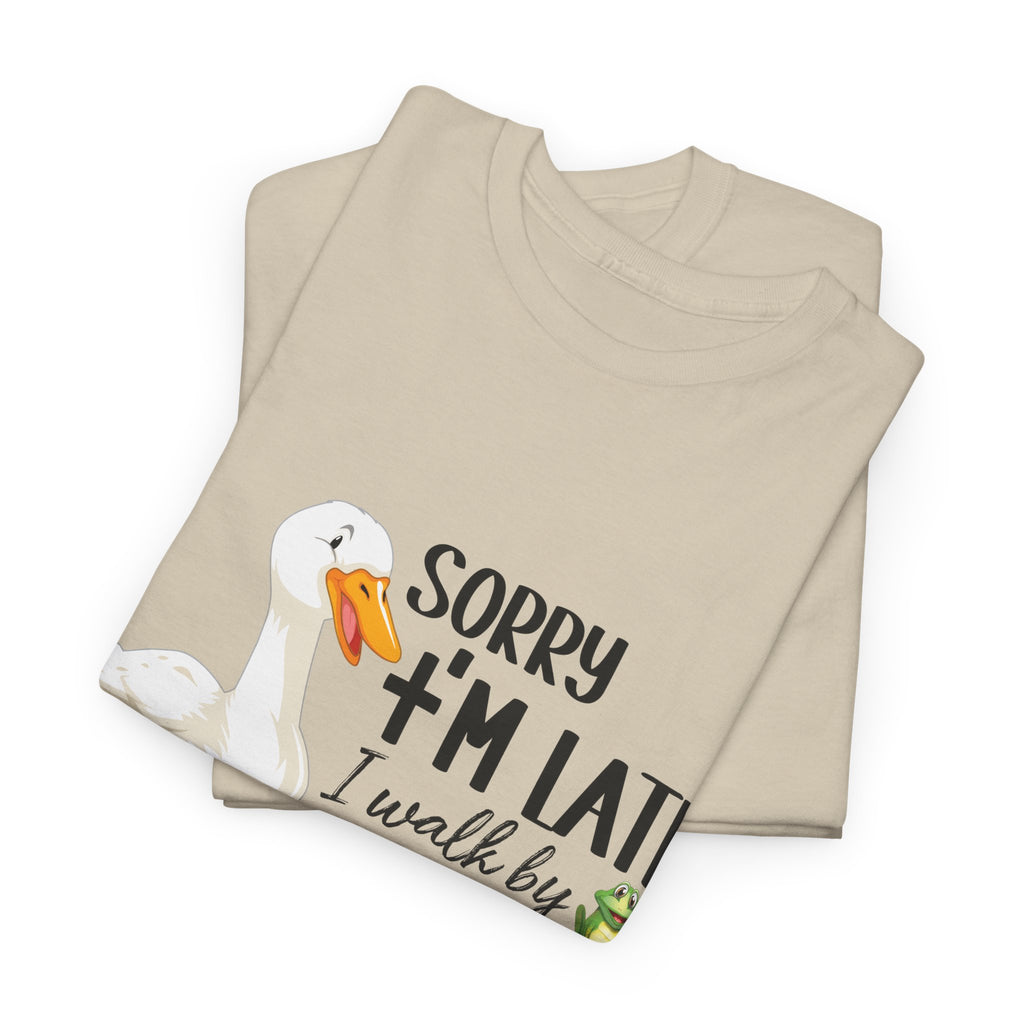 Christian Humor T-Shirt — “Sorry I’m Late, I Walk by Faith Tripping Constantly” (Duck & Frog). Unisex Cotton Tee